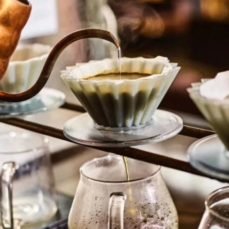 Making pour over coffee with clear ORIGAMI coffee dripper and Pinot Aroma Coffer server