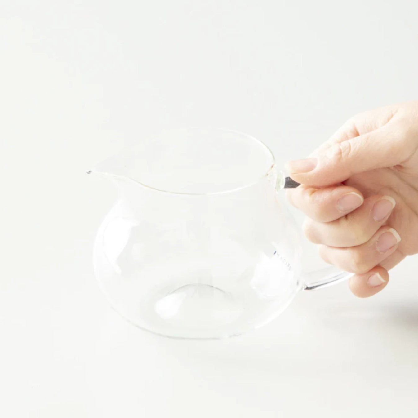 Holding an ORIGAMI Pinot Aroma Coffee Server