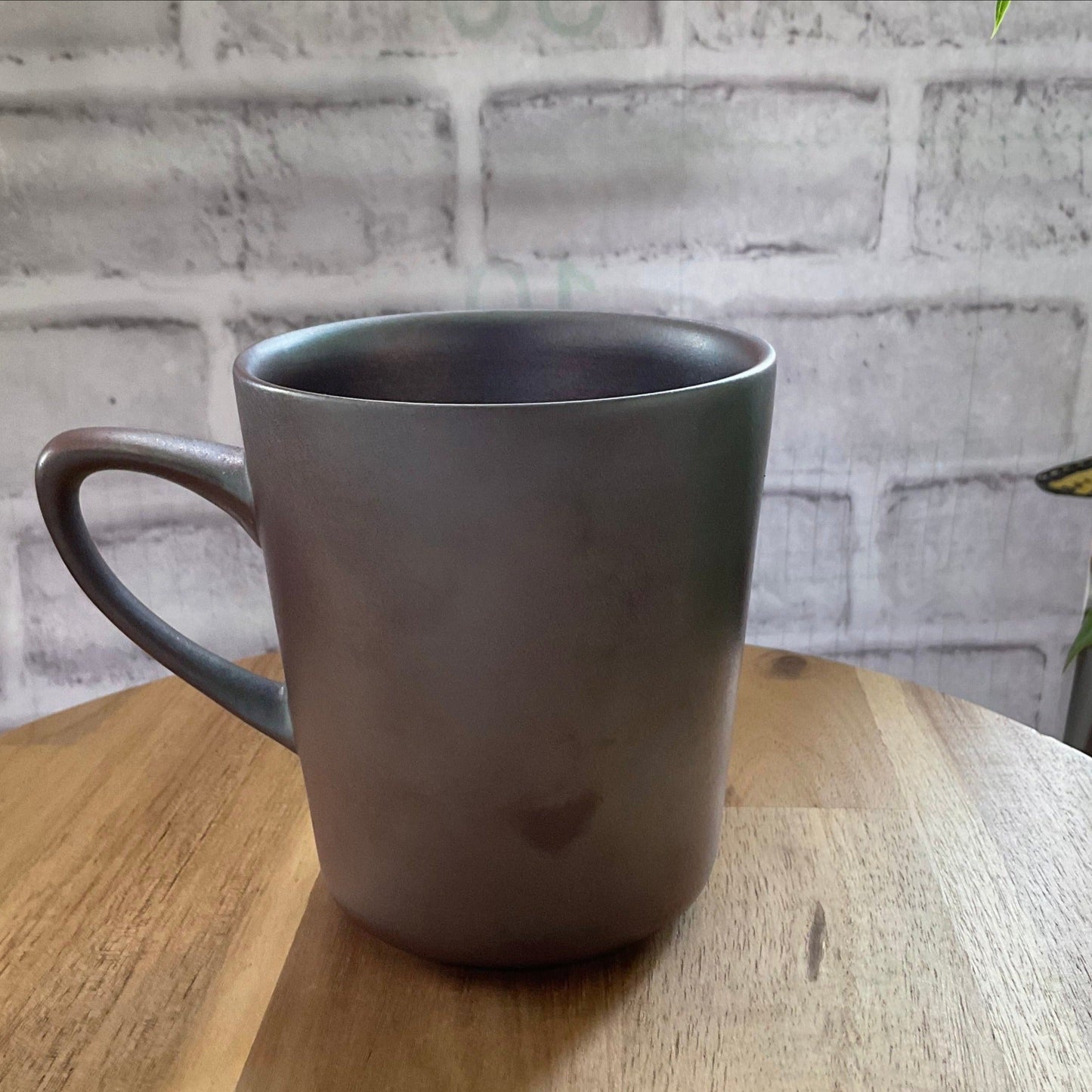 A Closer Look to Show the Matte Purple Color and the Fire Mark on the Side of the Wabi-Sabi Purple Wood-Fired Ceramic Mug