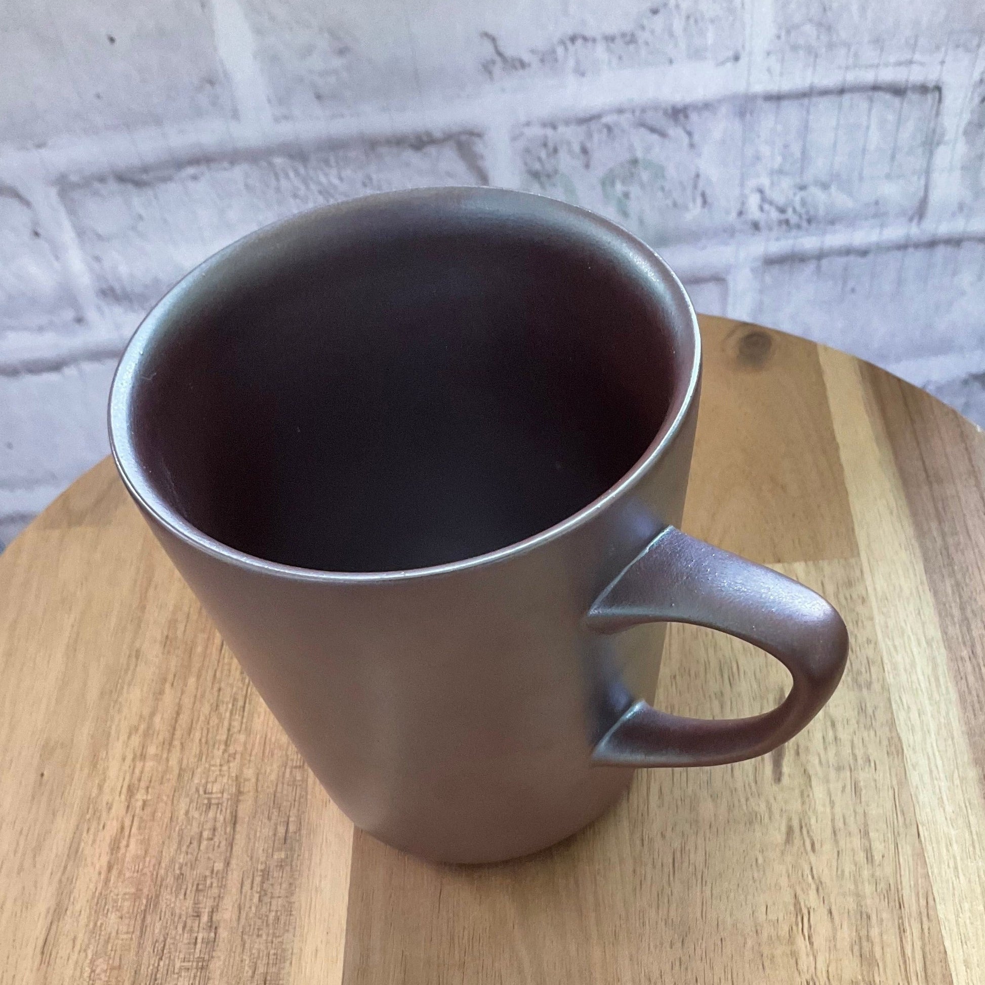 Under Natural Light, Another Angle View of the Silky Texture of the Wabi-Sabi Purple Wood-Fired Ceramic Mug