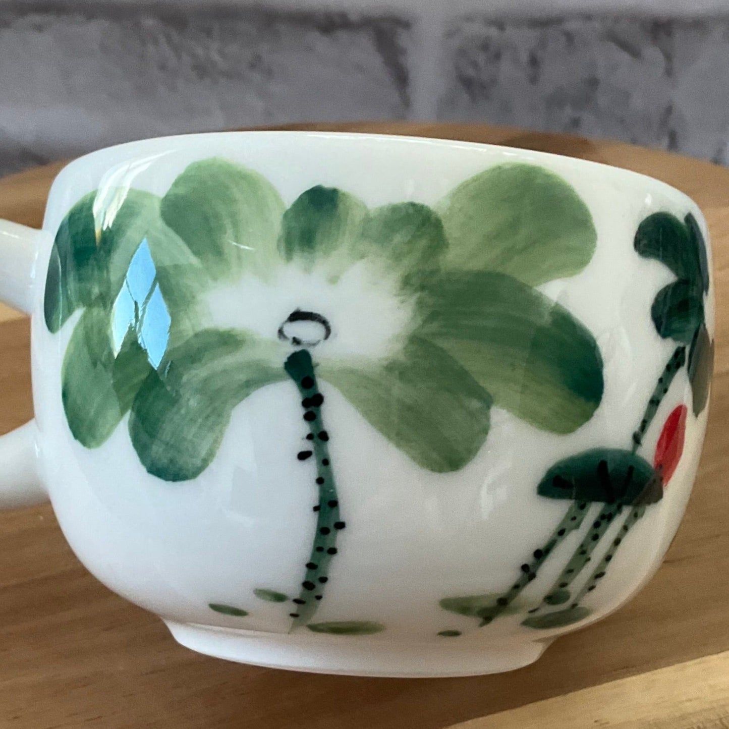 A Tilt View of a Waterlily Latte Cup, Beautiful  Brush Strokes on a High Quality Porcelain Felt Ceramic Cup