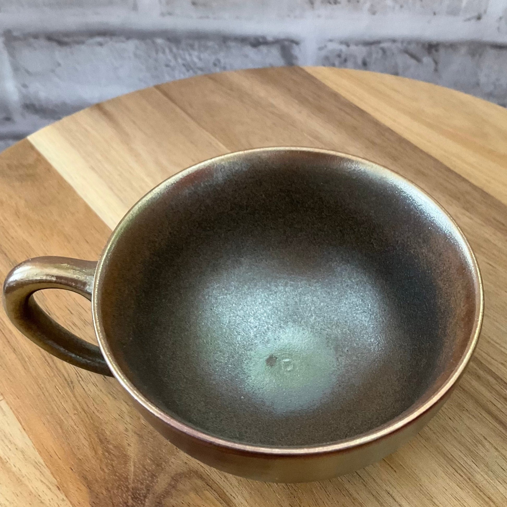 Top View of the Green-Golden Wood-Fired Ceramic Cup