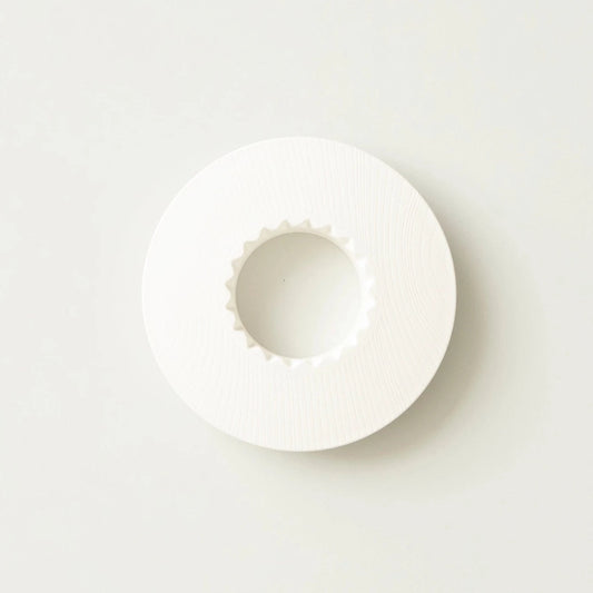 a white ORIGAMI grain dripper holder