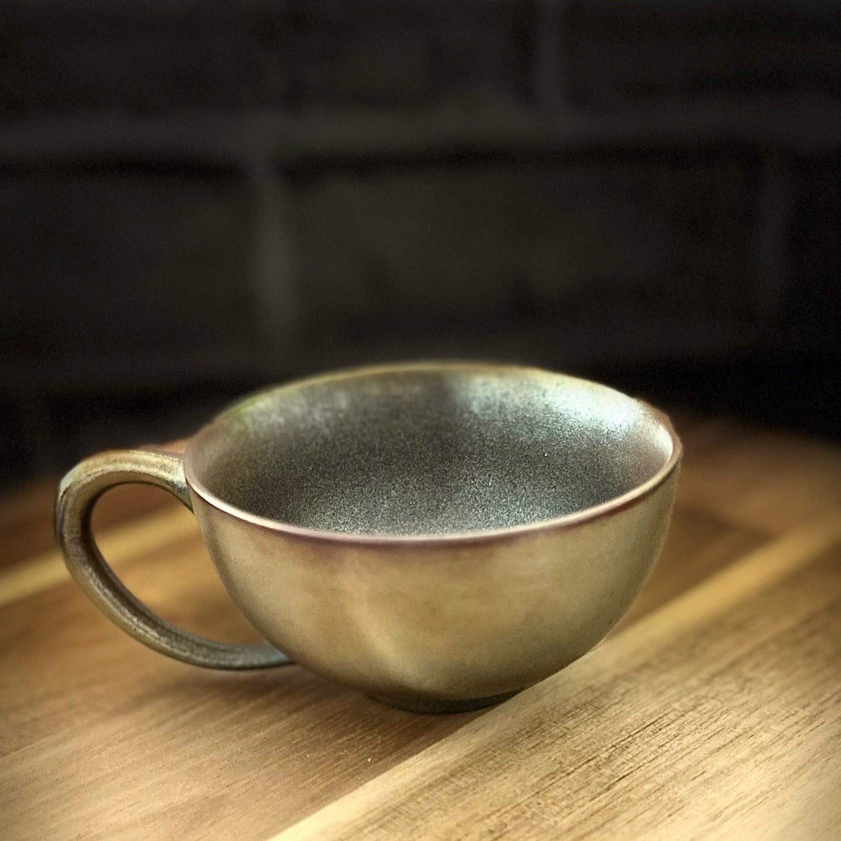 Green Golden Wood-Fired Ceramic Latte Cup under Stage Light Setting