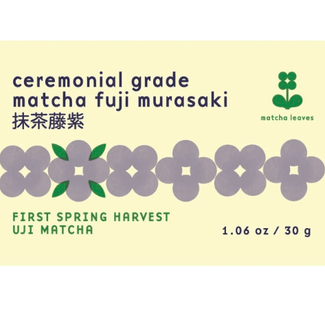 Packaging of ceremonial grade matcha fuji murasaki with floral design on a light yellow background.