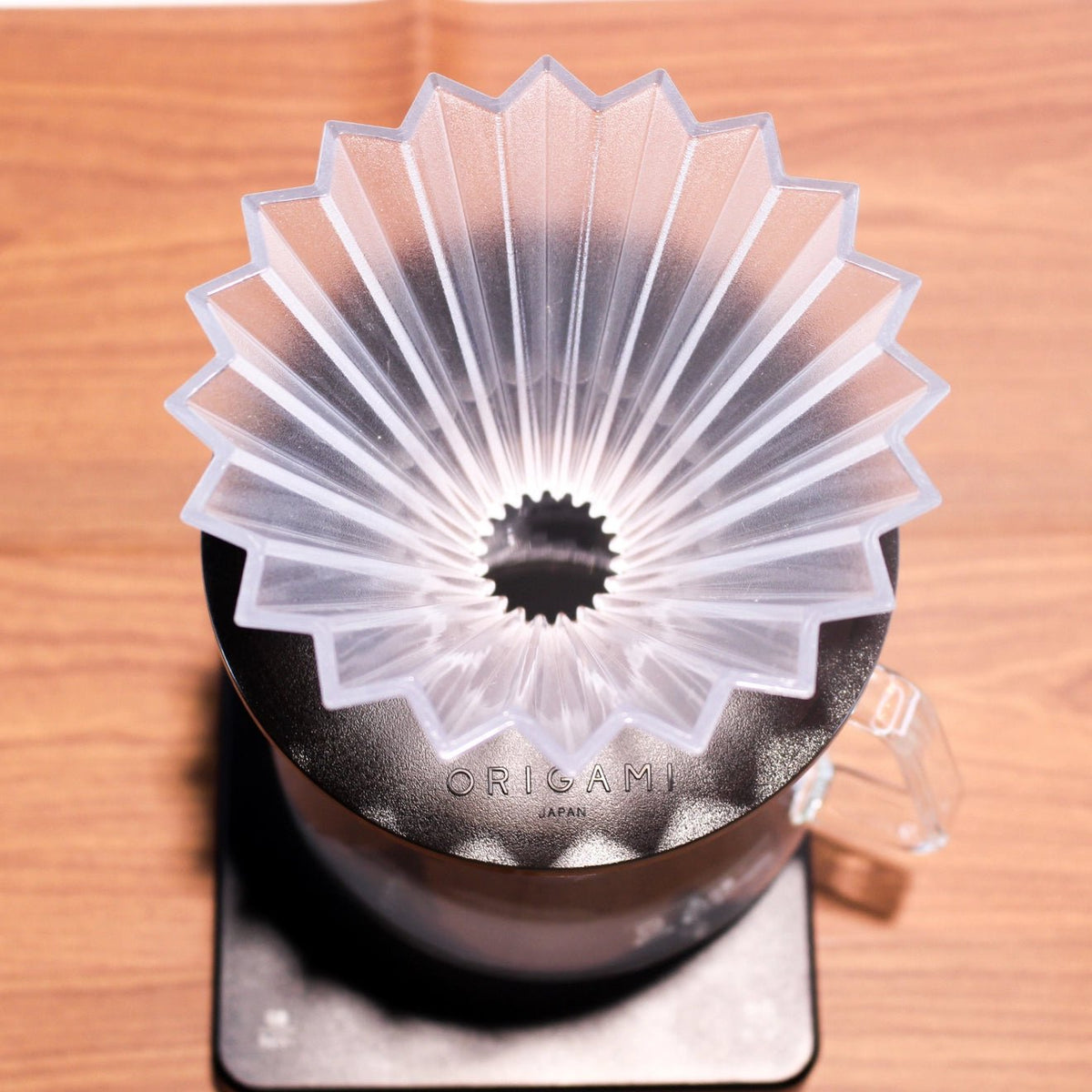 Origami coffee filter on a wooden surface